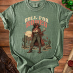 Green t-shirt with "Roll for Rodeo" text and a devilish cowgirl holding a D20 die.