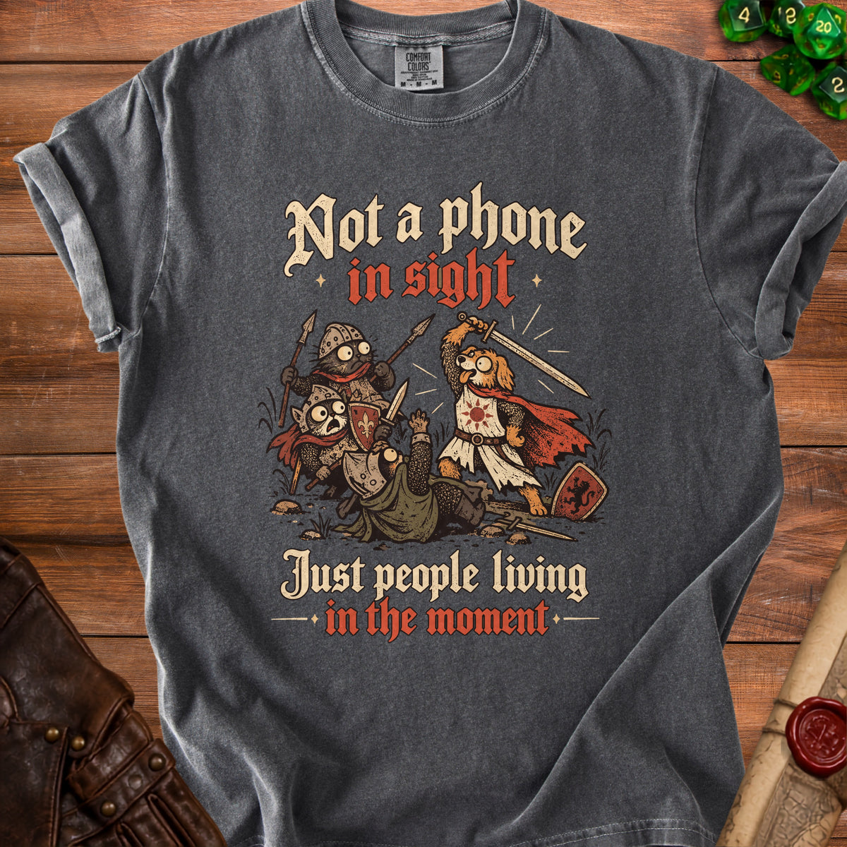 Dark grey t-shirt with "Not a phone in sight, Just people living in the moment" text.