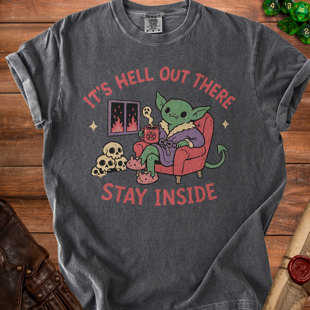 T-shirt with graphic of a goblin saying "It's Hell Out There Stay Inside."