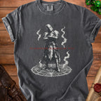 Dark grey t-shirt with Summoned Against My Will graphic of a knight on a magic circle.