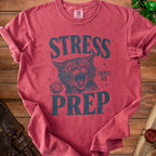 Red t-shirt with distressed graphic of a screaming cat and D20 dice reading "Stress Counts As Prep".