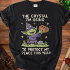 Goblin in wizard hat holding brick with text "The Crystal I'm Using to Protect My Peace".