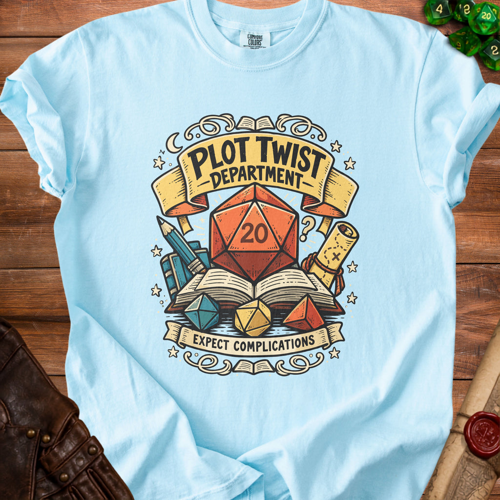 Light blue t-shirt graphic with "Plot Twist Department" and "Expect Complications."