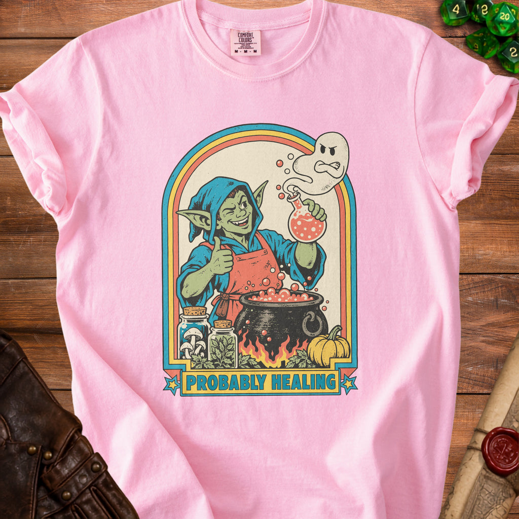 Goblin mixing potion with ghost and text "PROBABLY HEALING" on pink shirt.