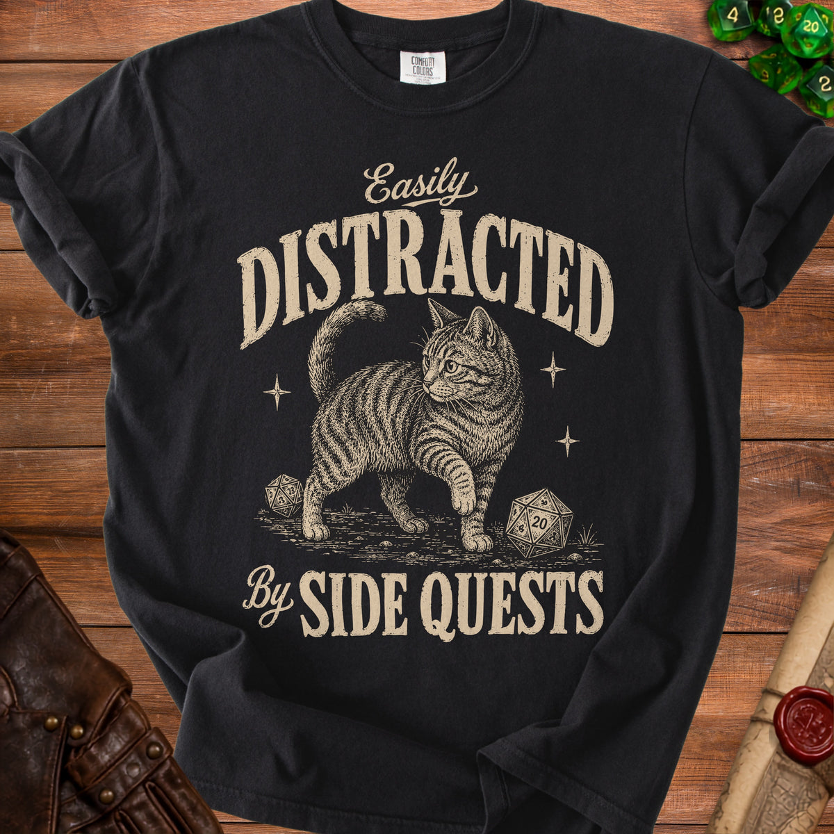 Black t-shirt with cat graphic and text "Easily Distracted By Side Quests."
