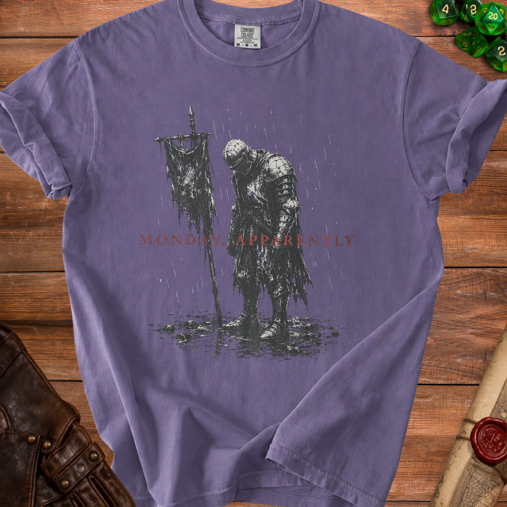 Purple t-shirt with illustration of a knight and the text "MONDAY, APPARENTLY".