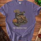 Monster chest with candy, pumpkin, and text "THE TREAT IS A TRAP".