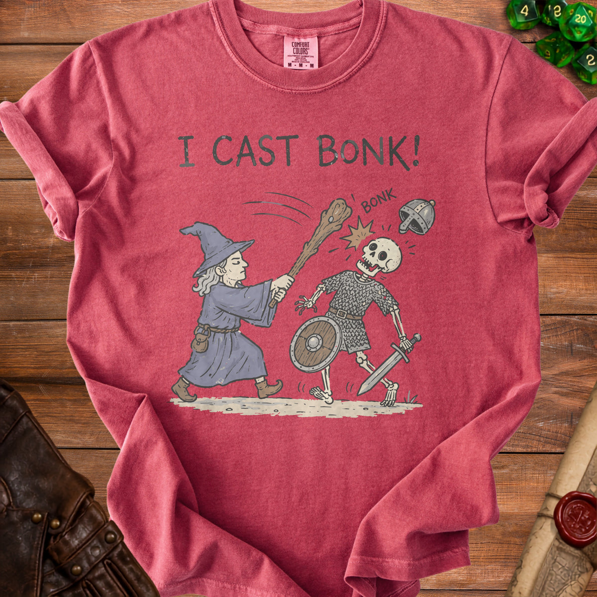 Red t-shirt with "I CAST BONK!" text and a wizard attacking a skeleton.