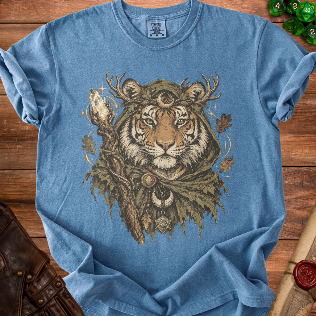 Blue t-shirt with print of a tiger wearing antlers, cloak, and holding a staff with crystal.