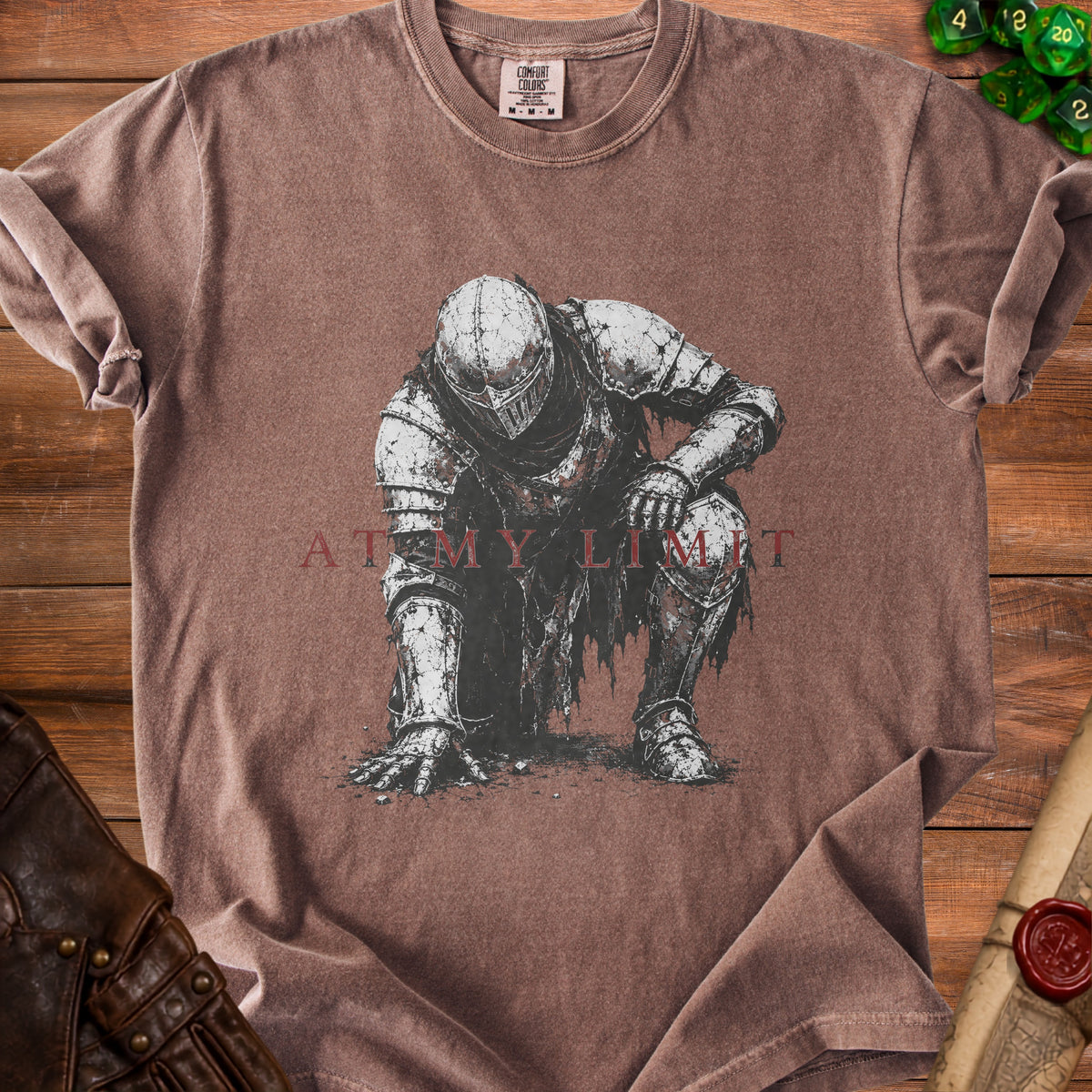 Brown t-shirt with "AT MY LIMIT" text and knight graphic.