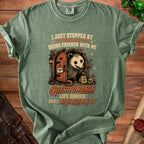 Green t-shirt with opossum artwork and text "Questionable life choice but I appreciate it".