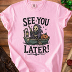 Pink t-shirt with grim reaper in a boat graphic saying "See You Later!"