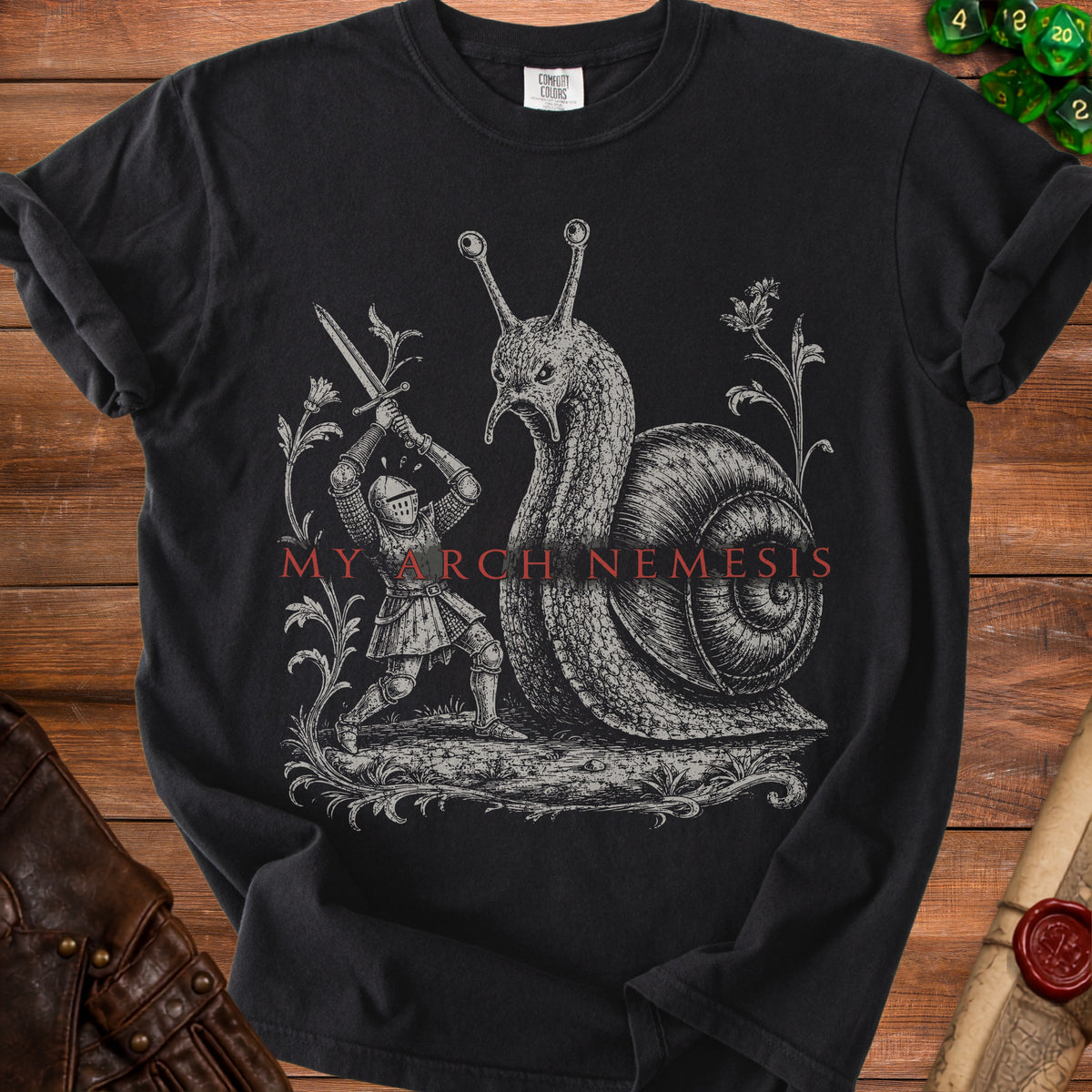 Black t-shirt featuring knight fighting a snail with text "MY ARCH NEMESIS".