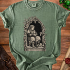 Green t-shirt with illustration of a sad dwarf and text "PLEASE DIE ANOTHER DAY".