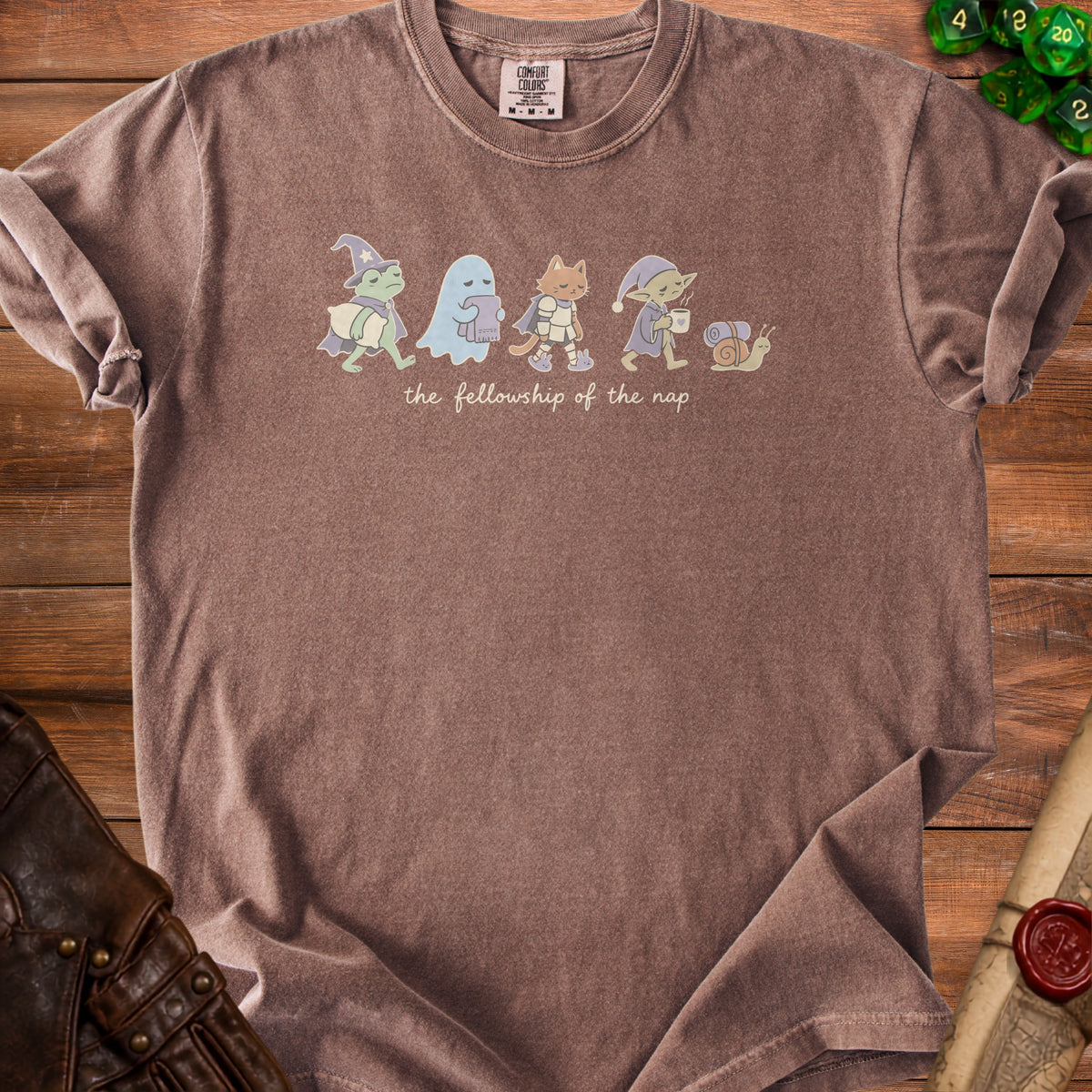 Brown t-shirt with cartoon characters and "the fellowship of the nap" text.