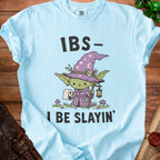 Light blue t-shirt with "IBS- I BE SLAYIN'" text and cartoon wizard.