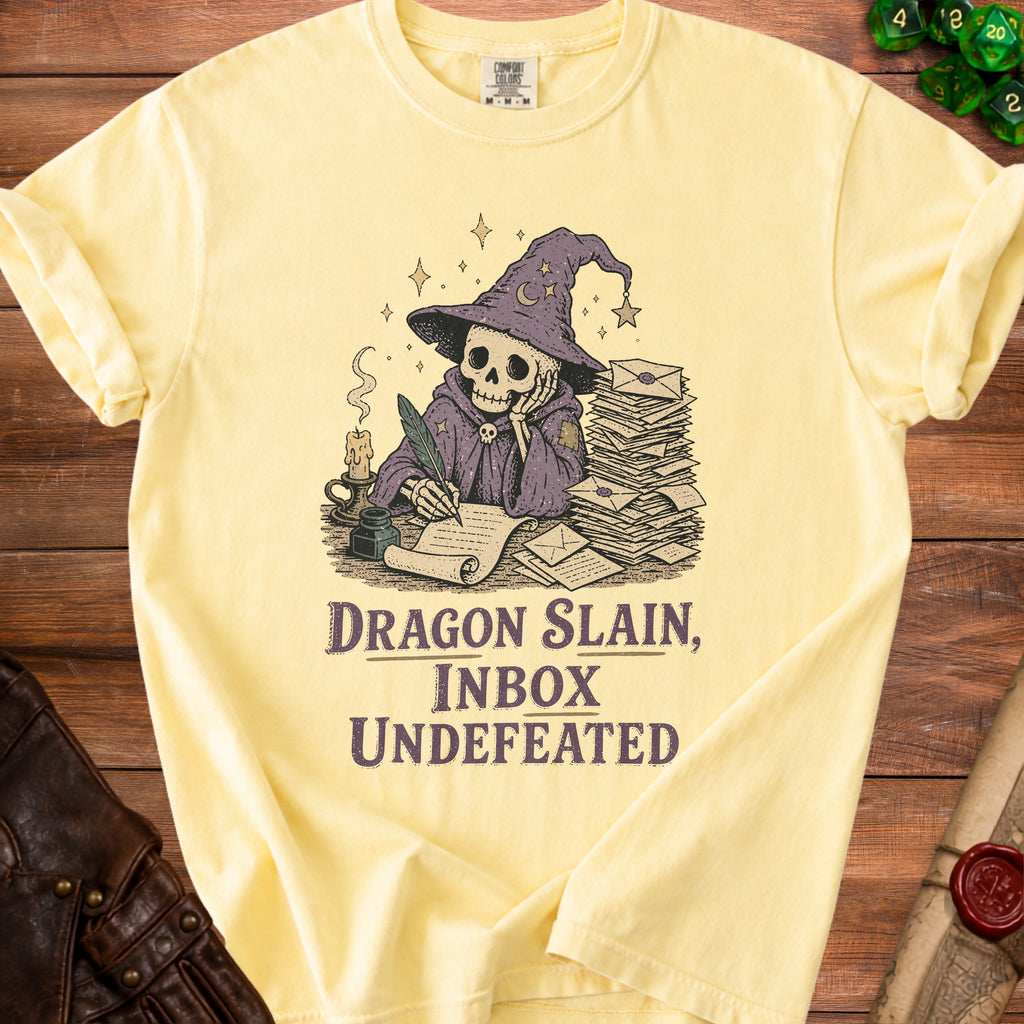 Yellow t-shirt with skeleton wizard writing, "Dragon Slain, Inbox Undefeated" text.