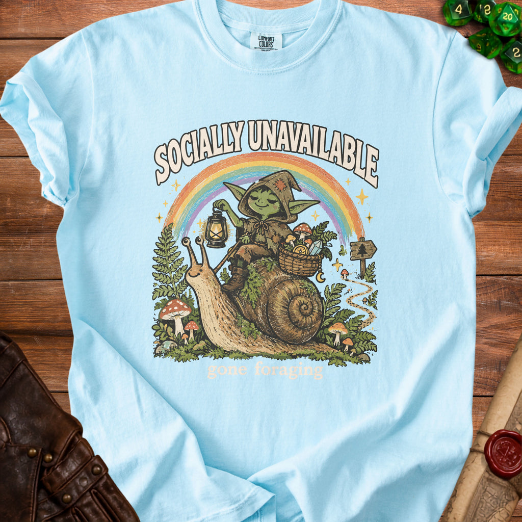 Light blue t-shirt with goblin riding snail, "Socially Unavailable" and "gone foraging" text.
