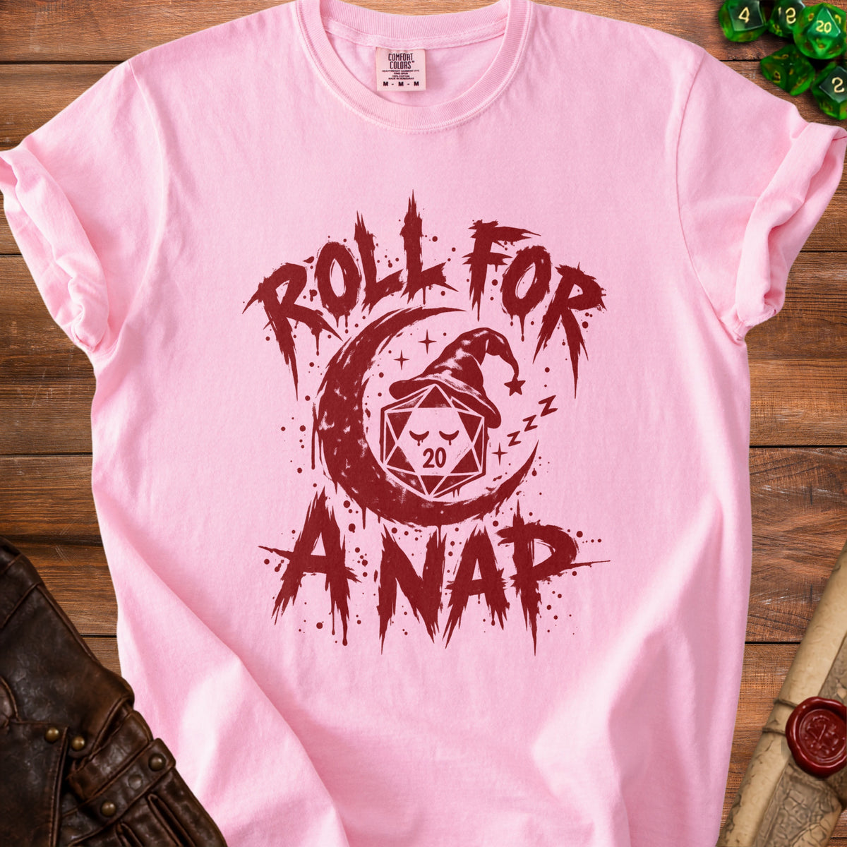 Pink t-shirt with "Roll for Anap" text, moon, wizard hat, and d20 dice graphic.