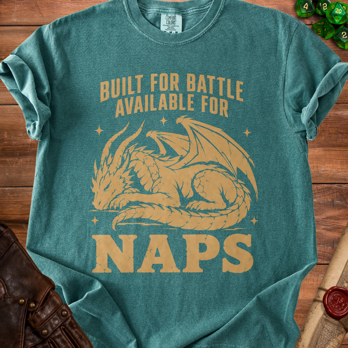 Teal t-shirt with gold dragon graphic and text "Built For Battle Available For Naps".