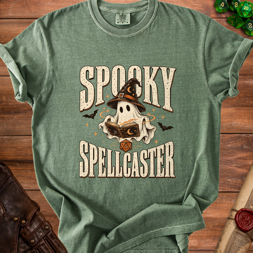 Green t-shirt with "Spooky Spellcaster" text, ghost in witch hat, and dice.