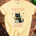 Light yellow t-shirt with black cat dressed as a bee and text about bees.