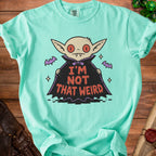 Aquamarine t-shirt with cartoon vampire graphic that reads "I'm Not That Weird".