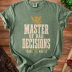 Green t-shirt with a dragon graphic and text "MASTER OF BAD DECISIONS YOURS, MOSTLY".