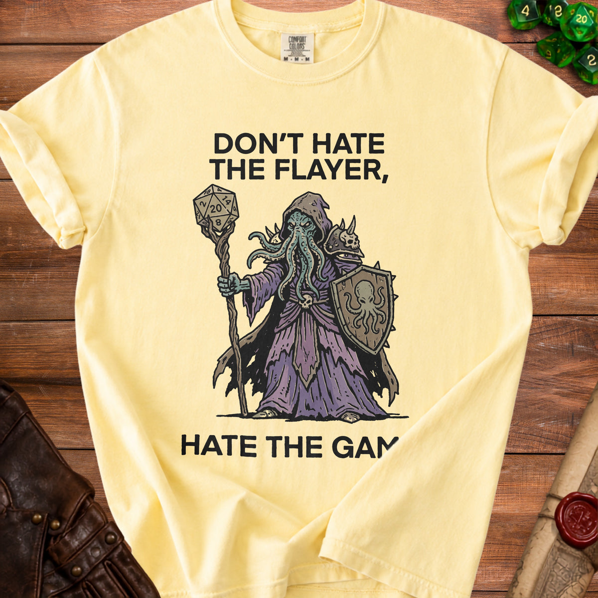 Yellow t-shirt with "Don't Hate The Flayer, Hate The Game" and Cthulhu illustration.