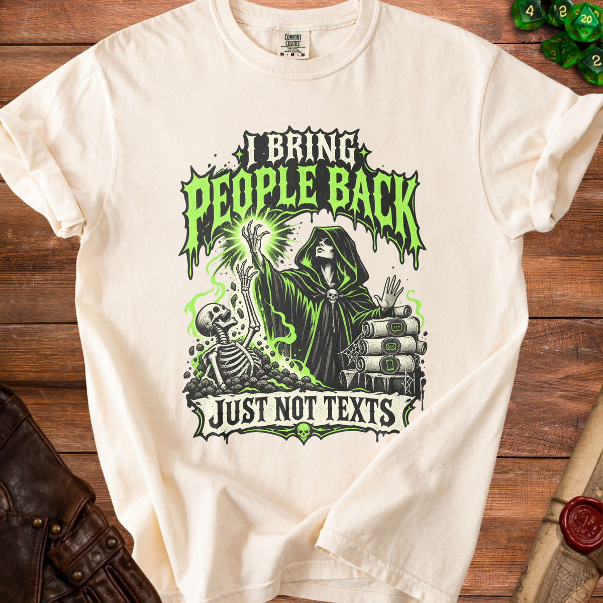 Cream t-shirt with graphic: "I bring people back, just not texts".