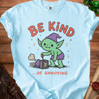 Light blue t-shirt with "BE KIND ...OF ANNOYING" text and a green goblin graphic.