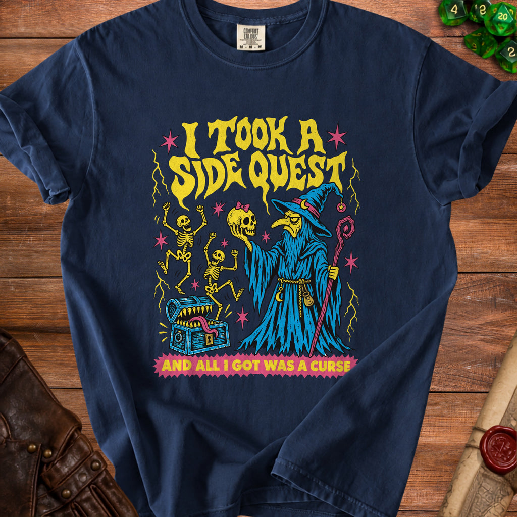 Navy blue t-shirt graphic with wizard, skeletons, and text "I took a side quest and all I got was a curse".