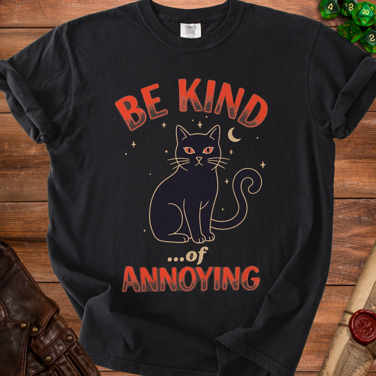 Black t-shirt with "Be Kind ...of Annoying" text and a black cat illustration.