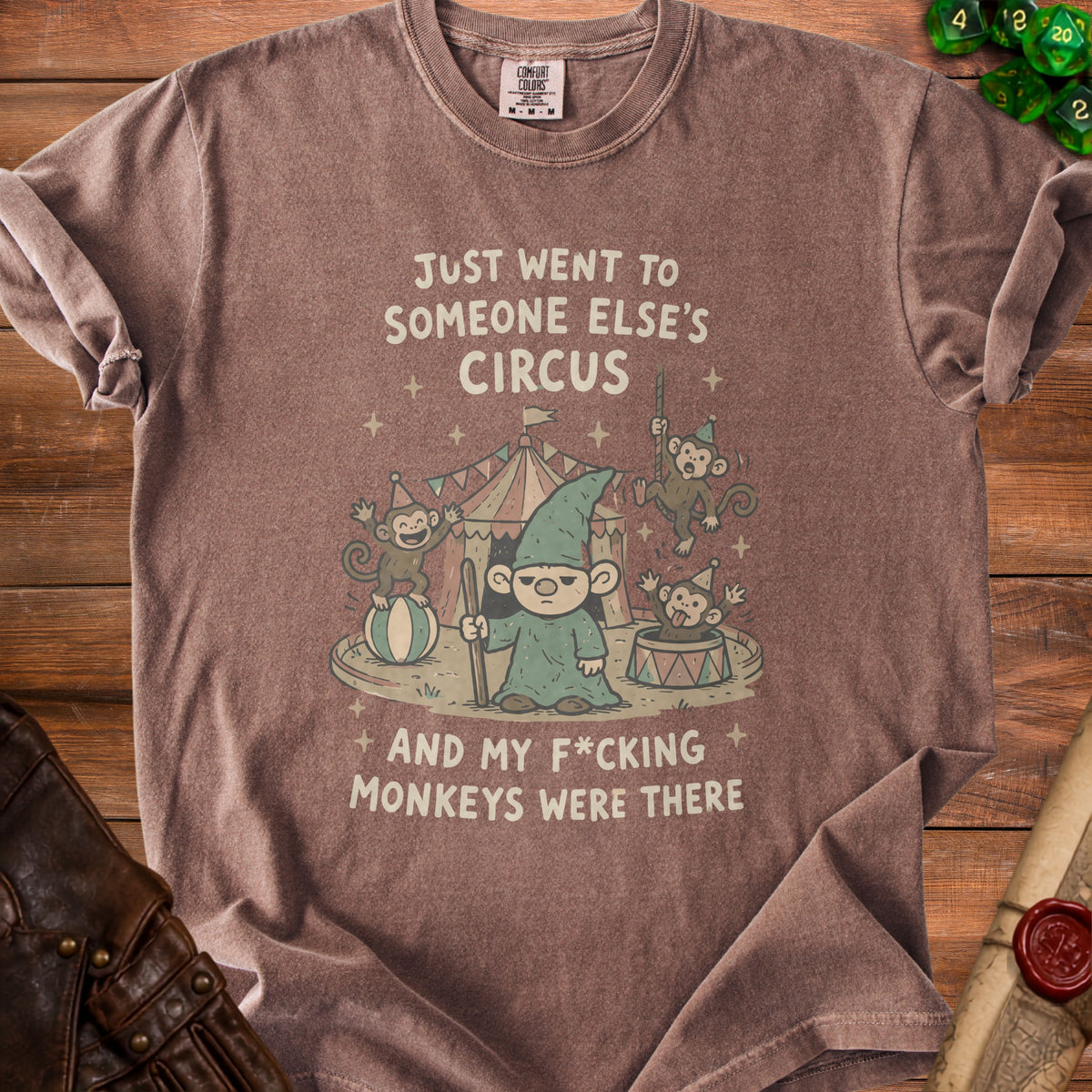 Brown t-shirt with graphic of a gnome and monkeys at a circus, text reads "Just Went To Someone Else's Circus And My F*cking Monkeys Were There".