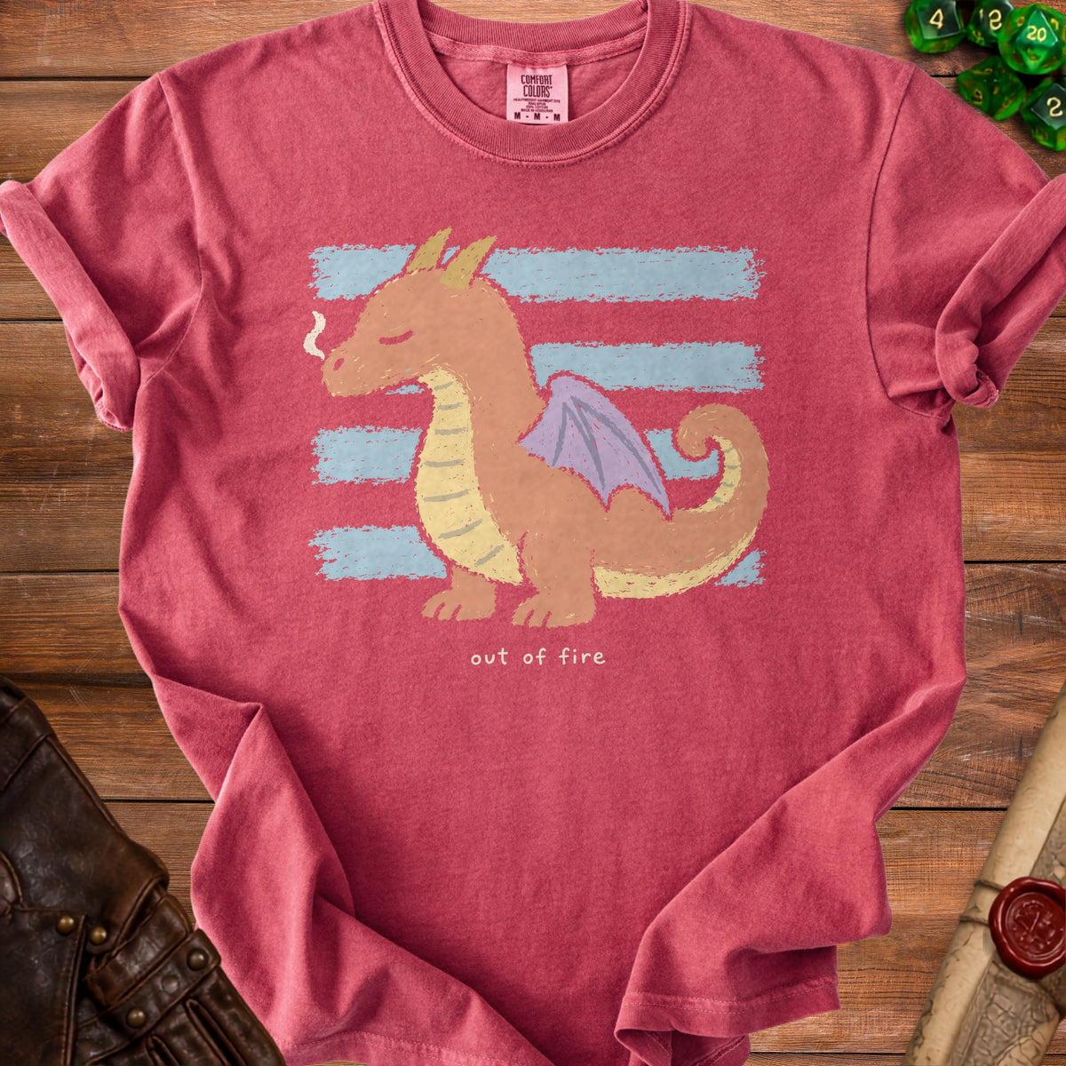 Red t-shirt with an orange dragon illustration and the text "out of fire".