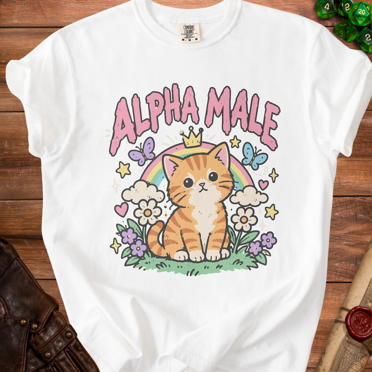 White t-shirt with a cartoon tabby cat wearing a crown and rainbow.