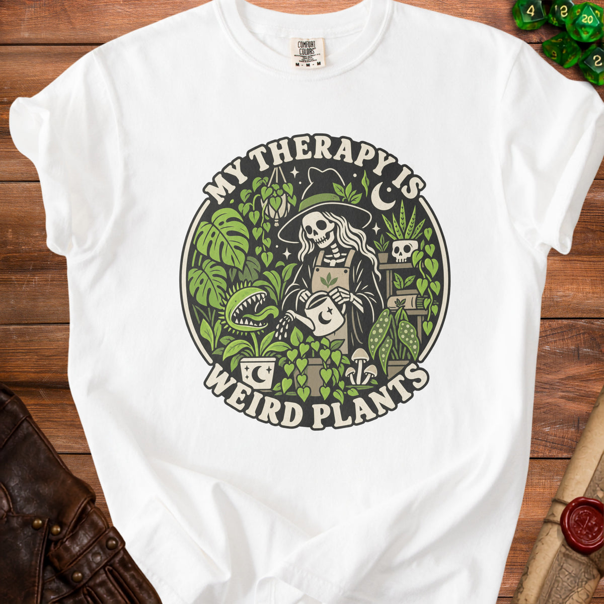 Skeleton gardener in a witch hat watering plants, "My Therapy is Weird Plants" text.
