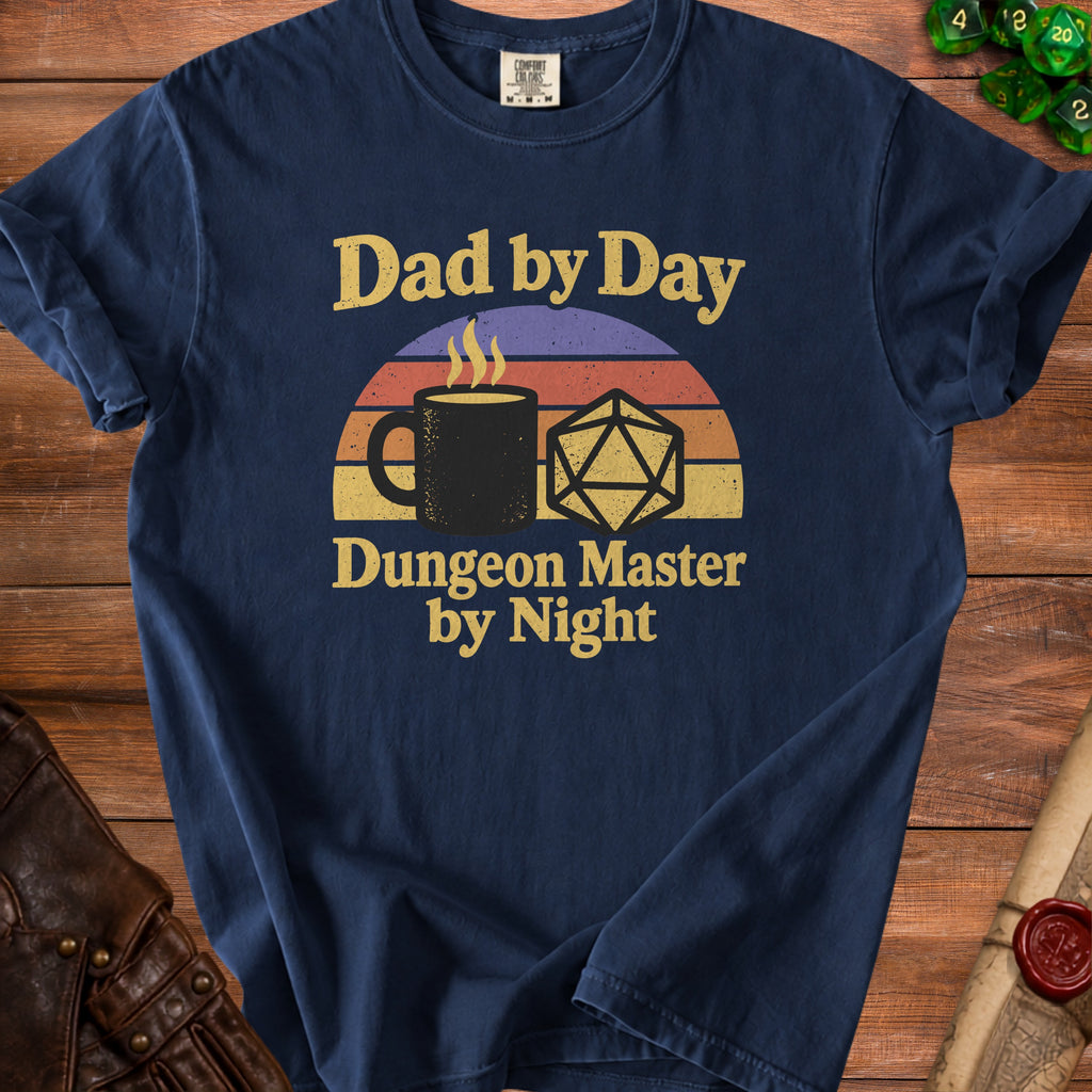 Navy t-shirt with "Dad by Day Dungeon Master by Night" text, mug, and dice graphic.