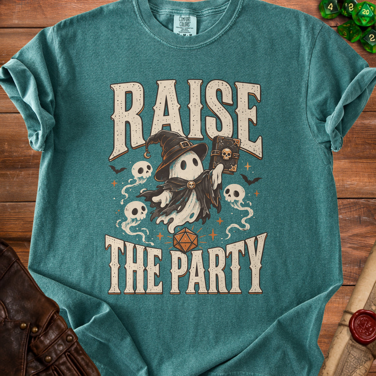 Teal t-shirt with a ghost holding a book, text "RAISE THE PARTY".