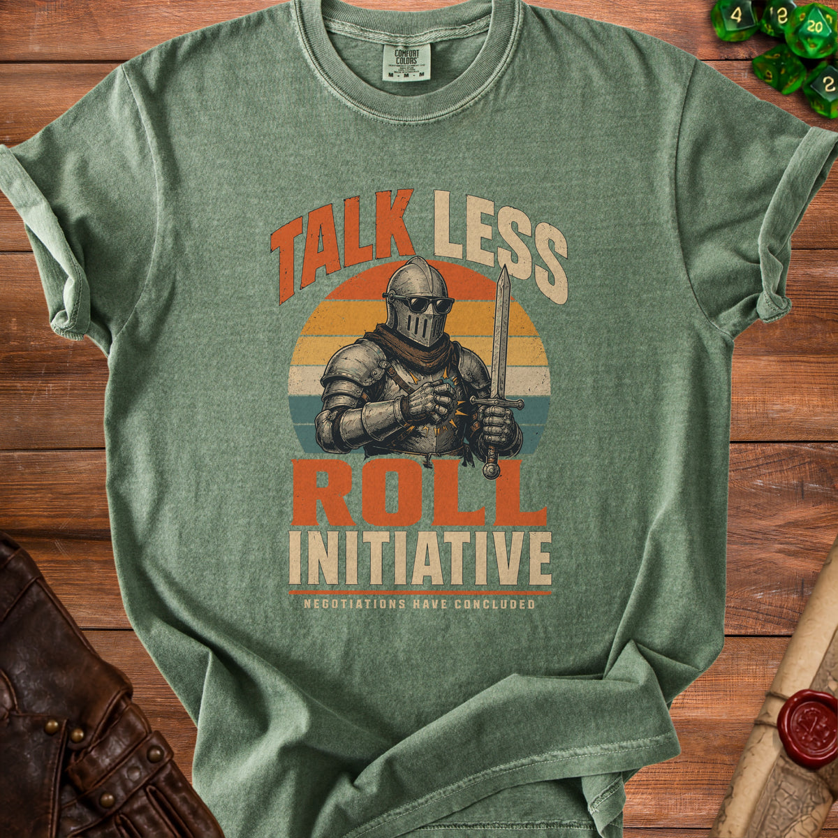 Green t-shirt with knight graphic reading "Talk Less Roll Initiative"