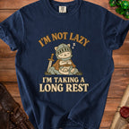 Navy t-shirt with cartoon cat knight sleeping, saying "I'm not lazy I'm taking a long rest".