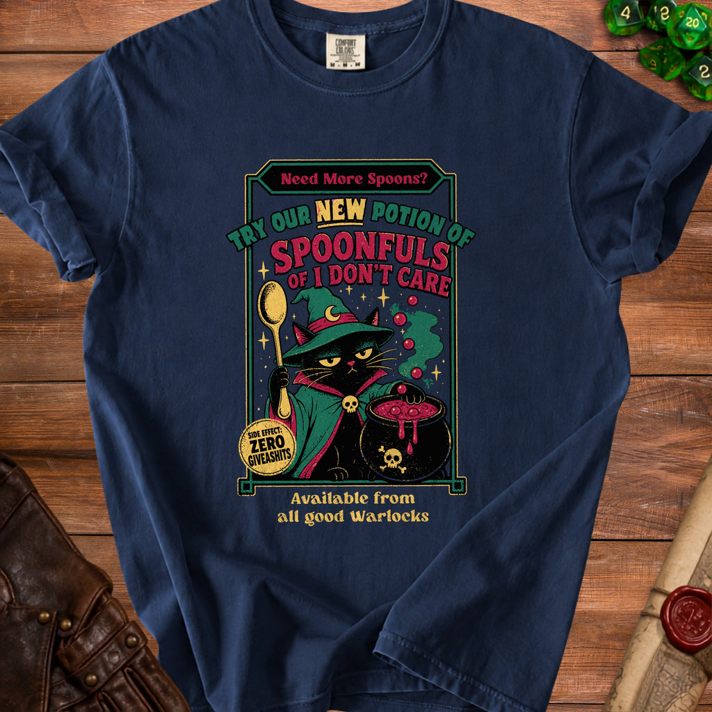 Navy t-shirt with graphic: black cat in witch hat holding a spoon and cauldron, "Spoonfuls of I Don't Care" text.