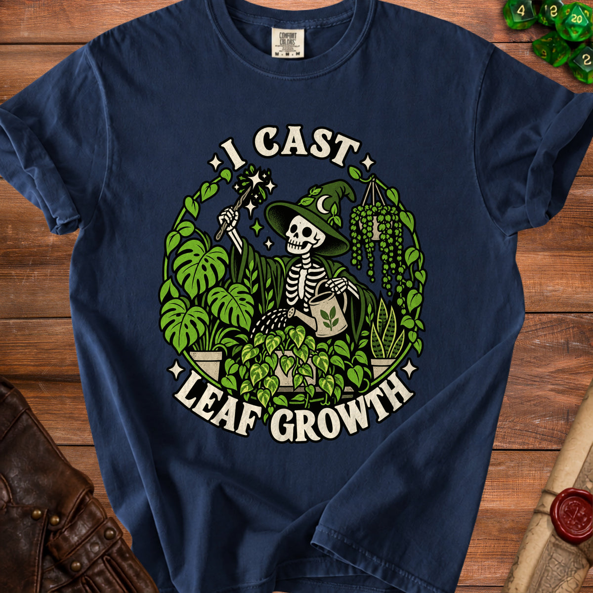 Skeleton wizard with hat and watering can surrounded by plants, text "I Cast Leaf Growth".
