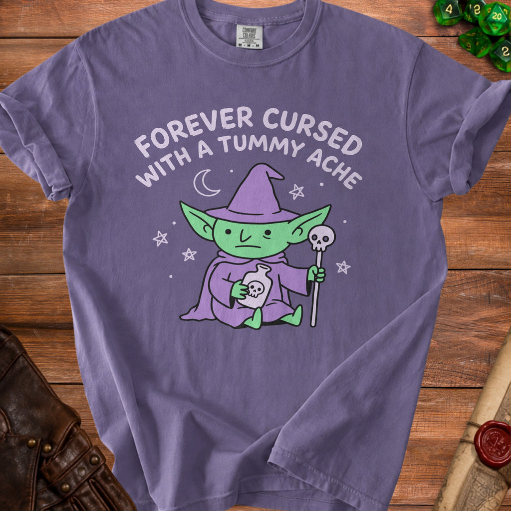 Purple t-shirt with a green goblin wizard graphic and "Forever Cursed with a Tummy Ache" text.