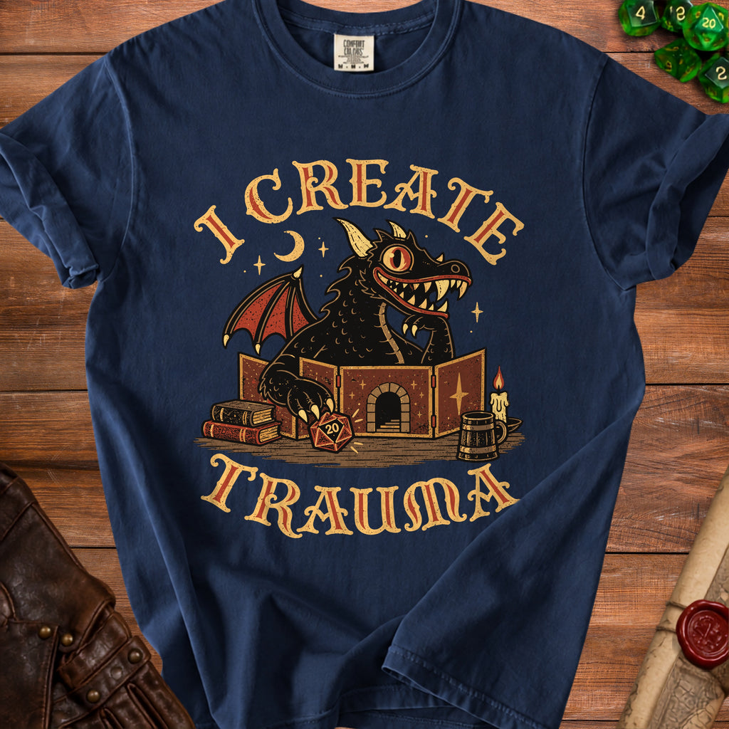 A dark blue t-shirt printed with a cartoon dragon dungeon master and the text I Create Trauma.