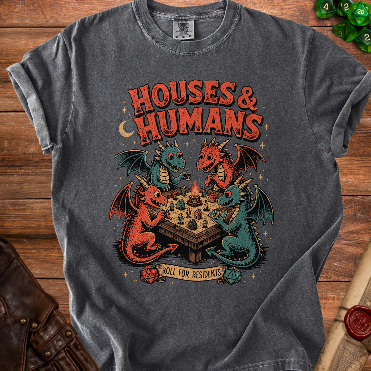T-shirt graphic with four dragons playing a board game titled "Houses & Humans".