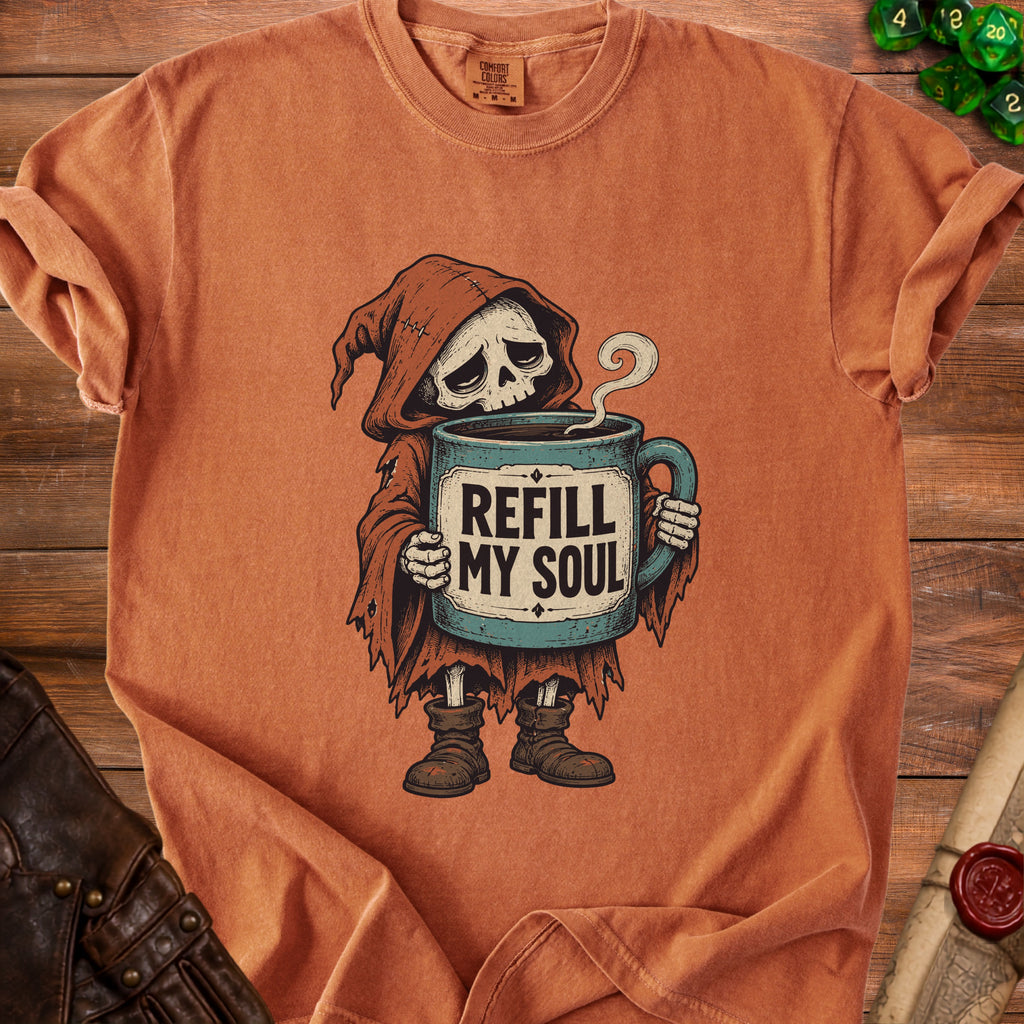 Grim reaper holding mug with text "Refill My Soul" on orange t-shirt.