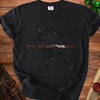 Black Comfort Colors t-shirt with distressed graphic and "BIG QUEST ENERGY" text.