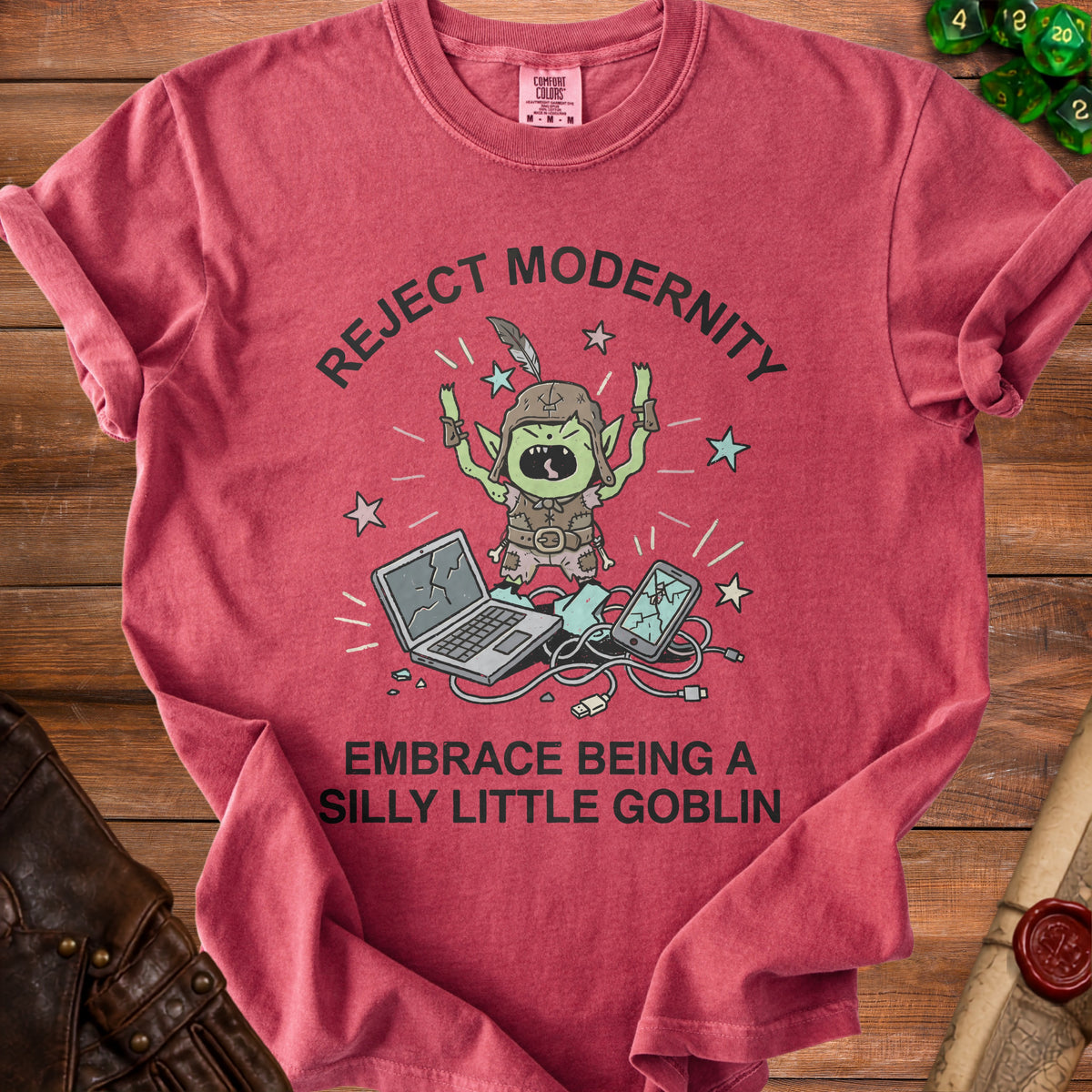 Red t-shirt with a goblin rejecting technology and embracing being a silly little goblin.