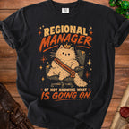 Black t-shirt with cartoon cat wearing crown, saying "Regional Manager of Not Knowing What is Going On".